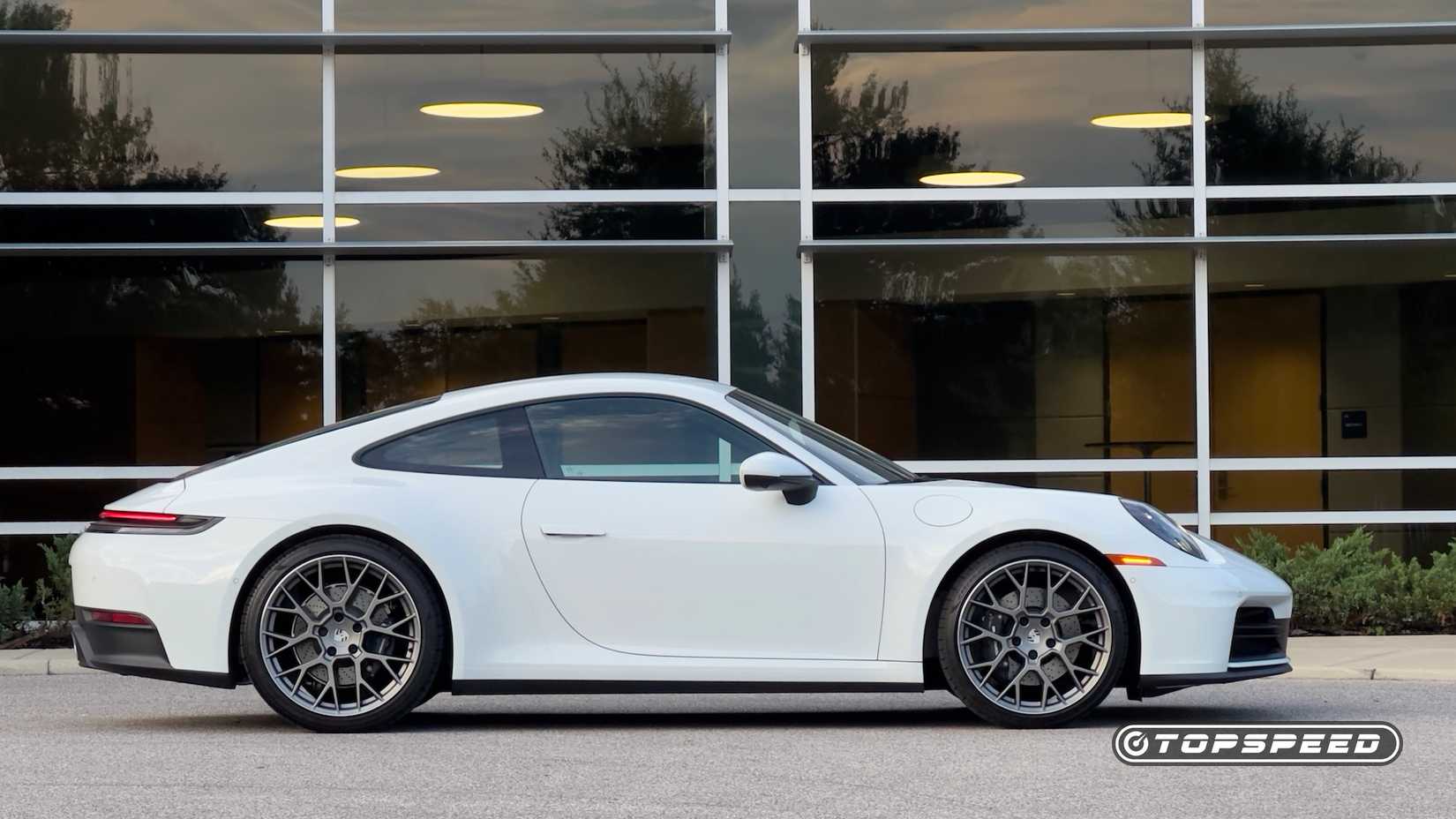 2025 Porsche 911 Carrera in white parked