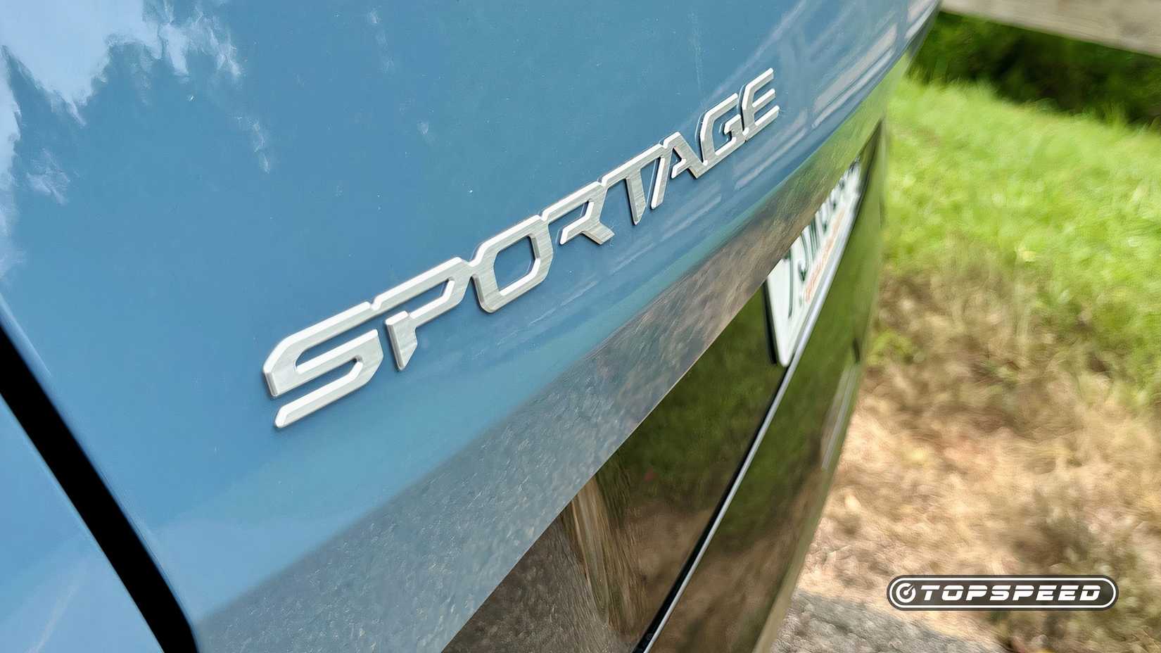 2026 Kia Sportage Hybrid badge