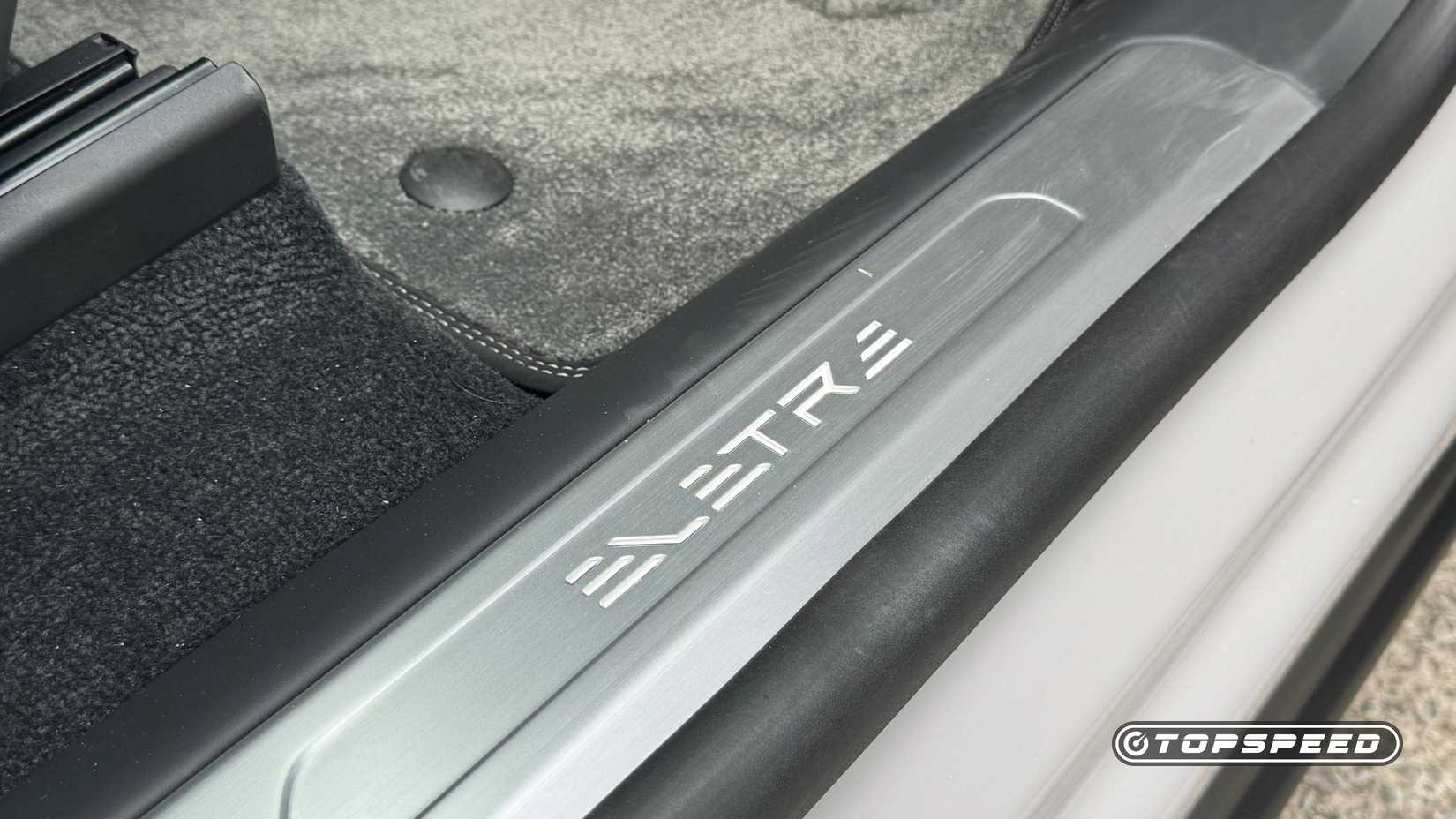 Close-up shot of the Eletre badging on the sill plate of a 2025 Lotus Eletre 600 Sport SE.