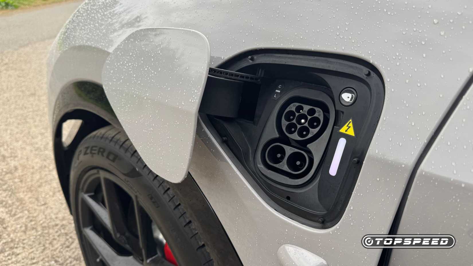 Close-up shot of the charging port on a gray 2025 Lotus Eletre 600 Sport SE.