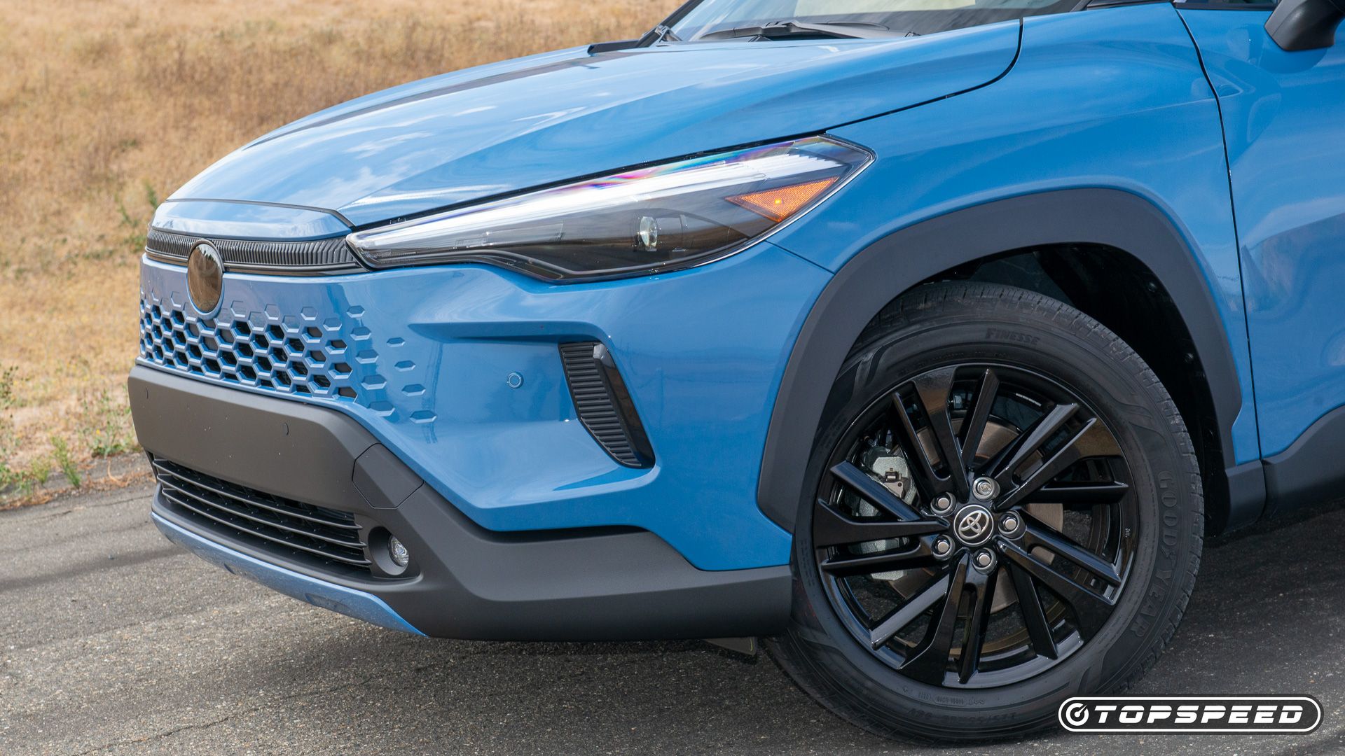 2026 Toyota Corolla Cross hybrid blue front 3/4