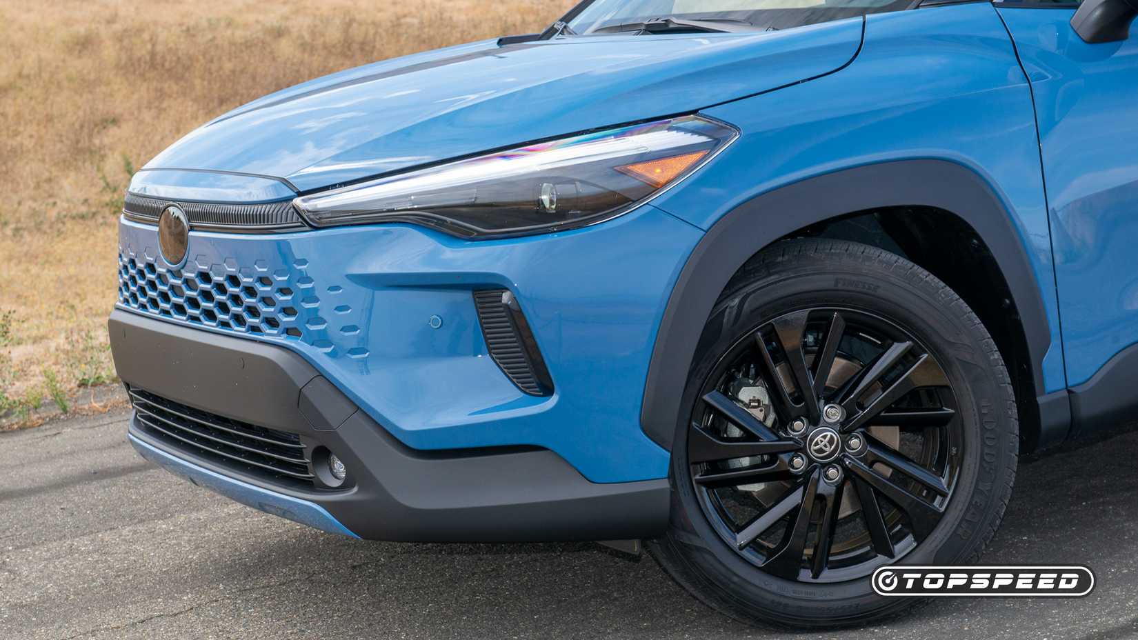 2026 Toyota Corolla Cross hybrid blue front 3/4