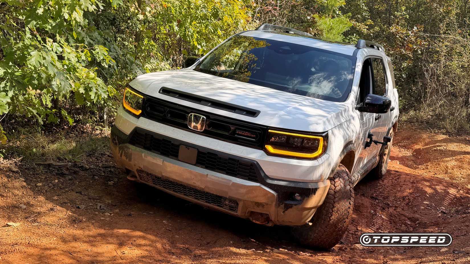 2026 Honda Passport TrailSport front 3/4 action