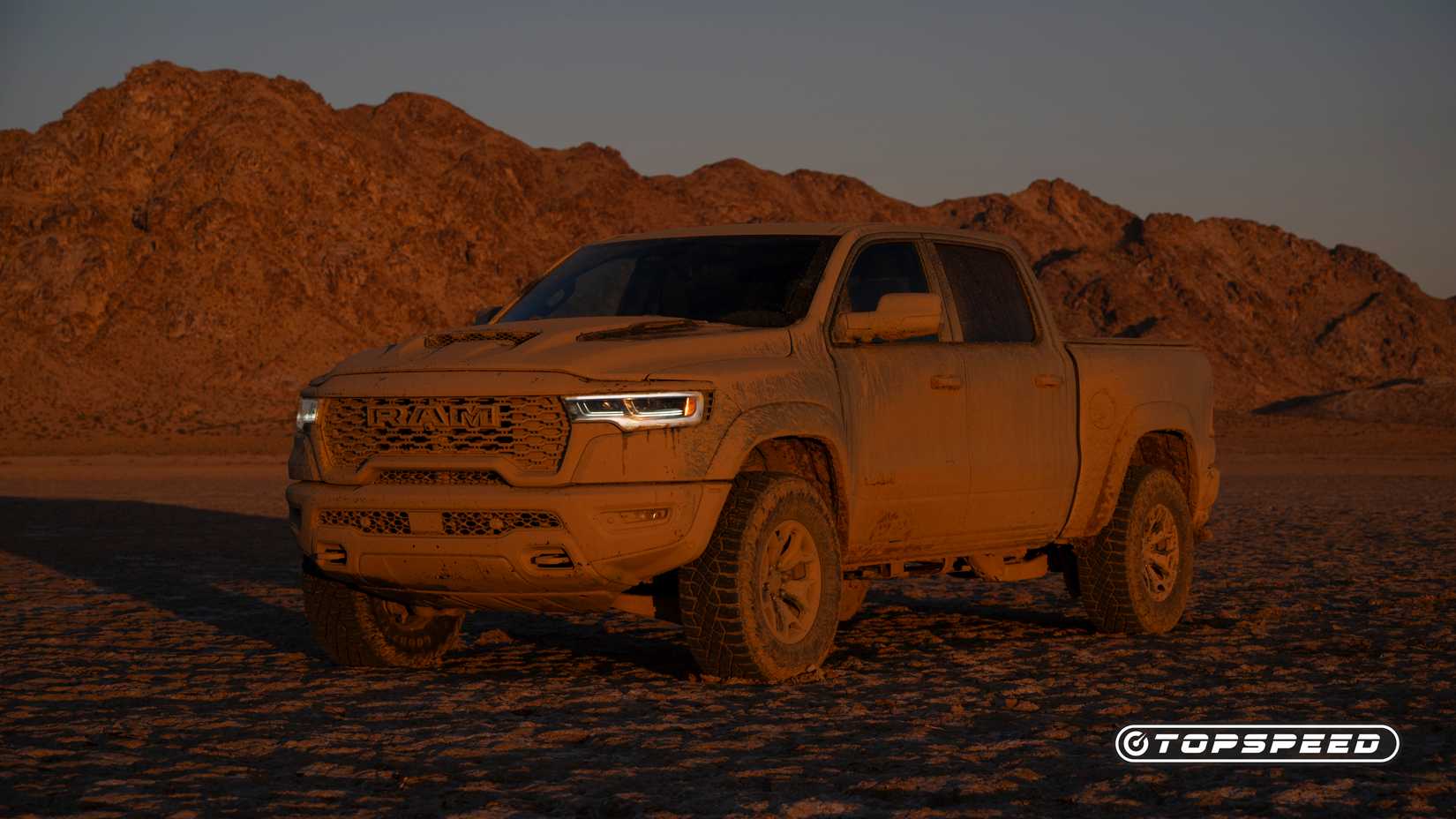 A dust-covered 2025 blue Ram 1500 RHO 