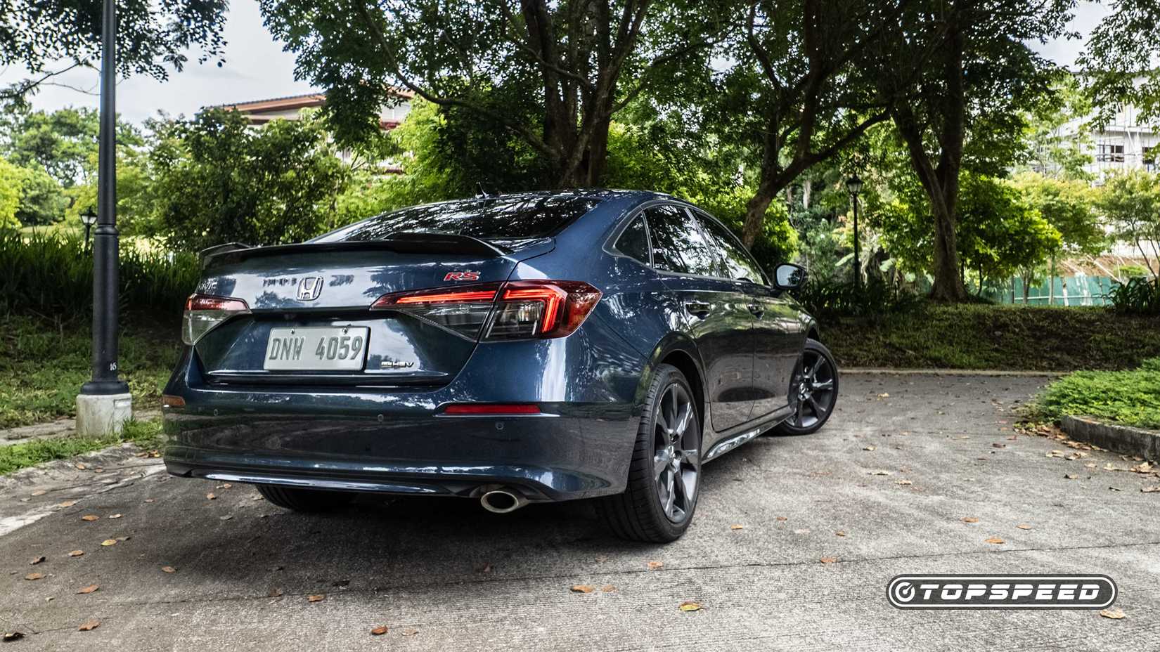 Rear 3/4 view of the 2025 Honda Civic Hybrid (Asian spec)