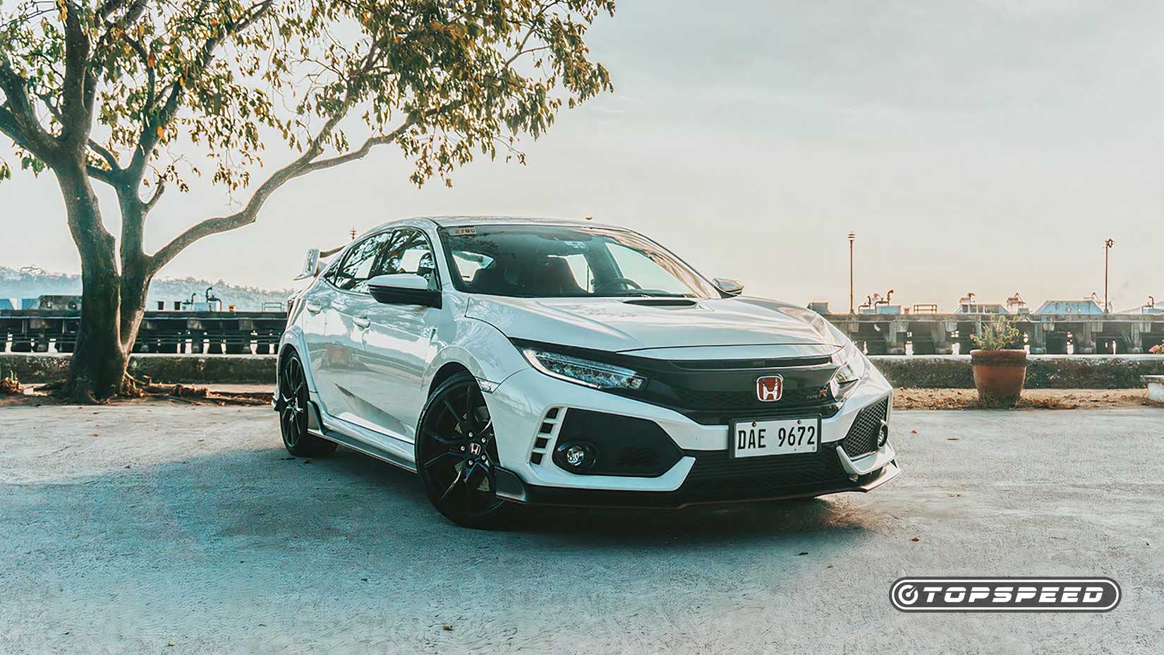 Front 3/4 view of a 2020 Honda Civic Type R parked in lot