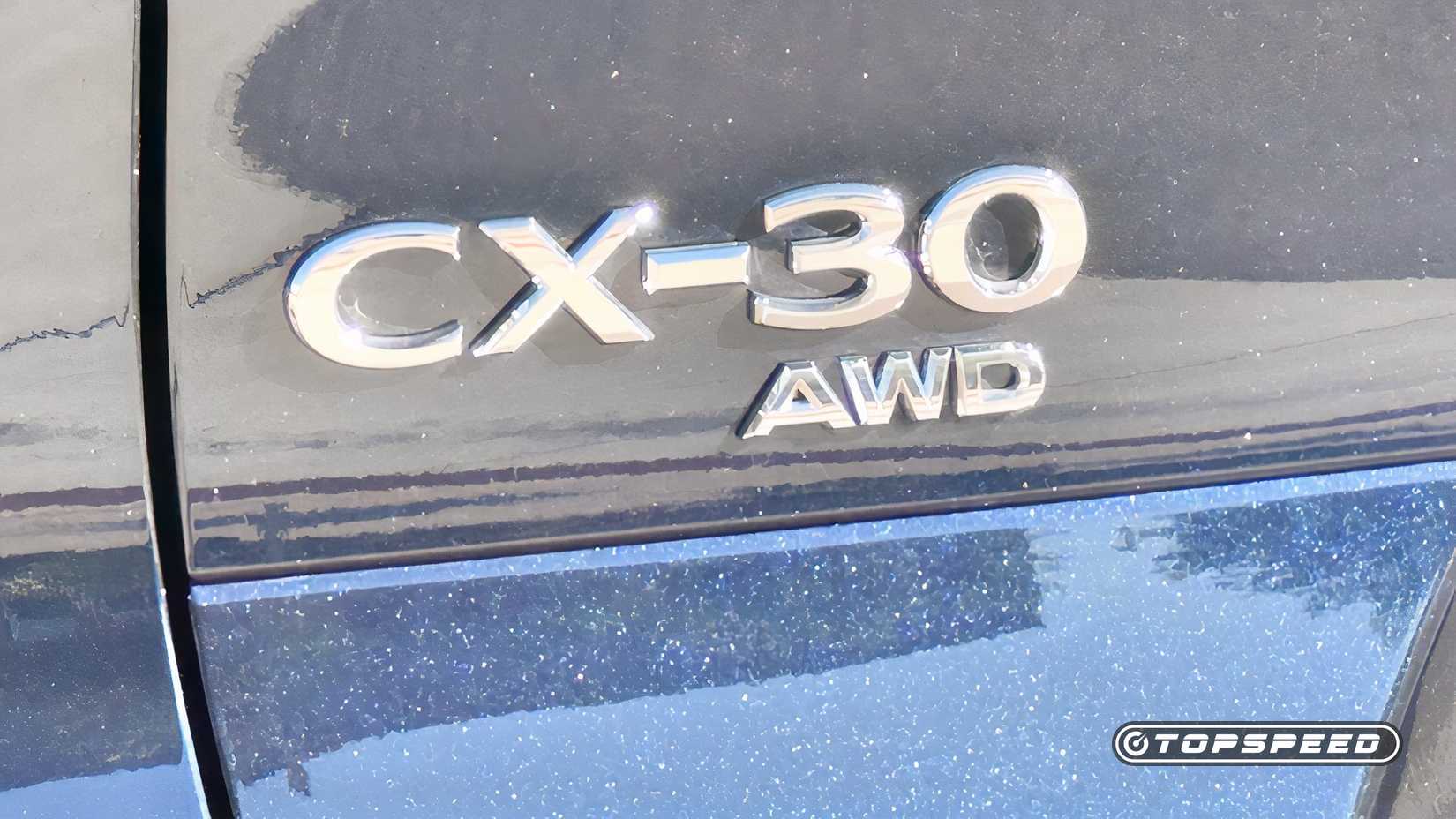 2025 Mazda CX-30 2.5 Turbo Premium Plus close-up shot of rear badge