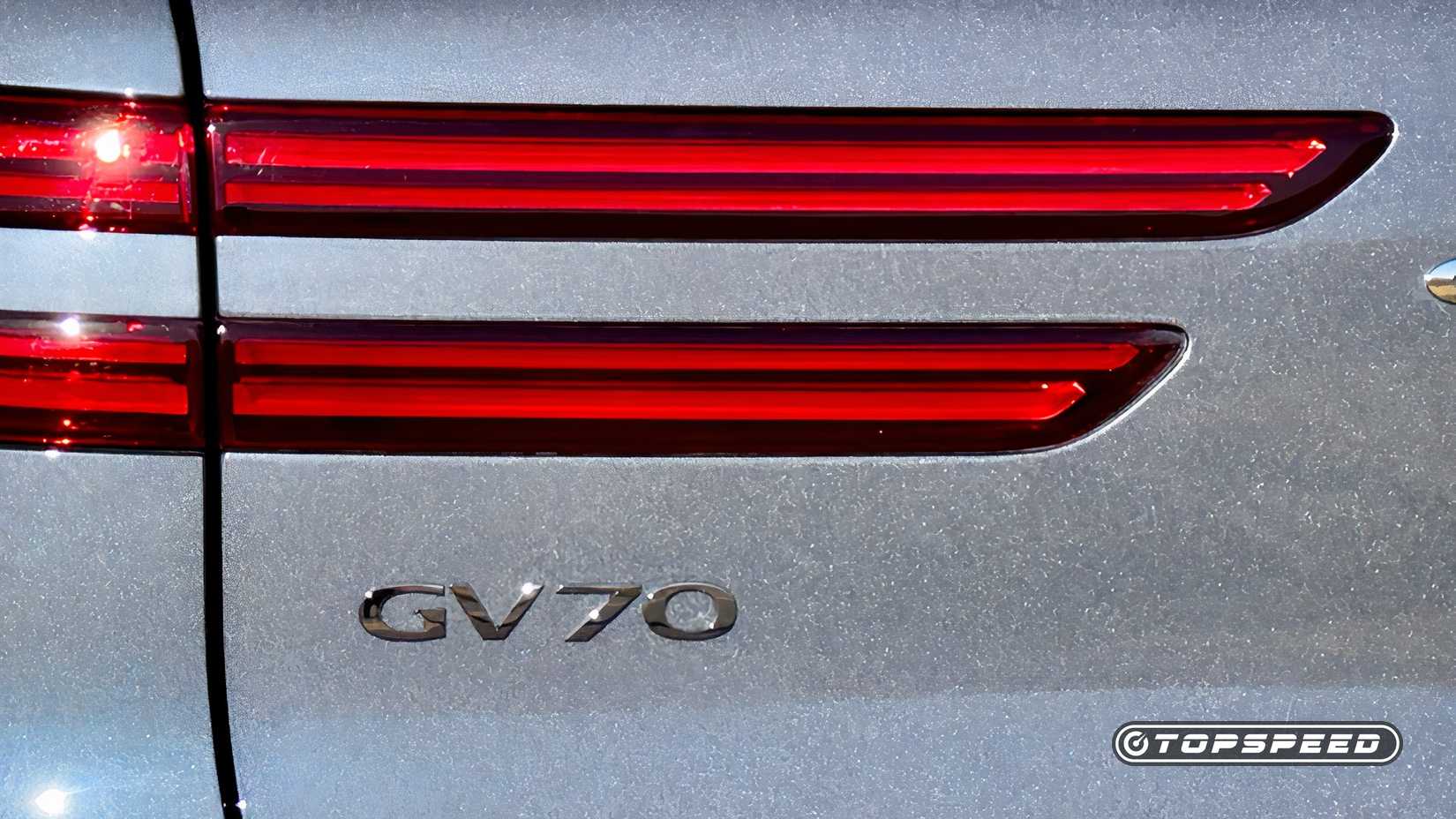 2026 Genesis GV70 3.5T Sport Prestige AWD Exterior GV70 Rear Badge