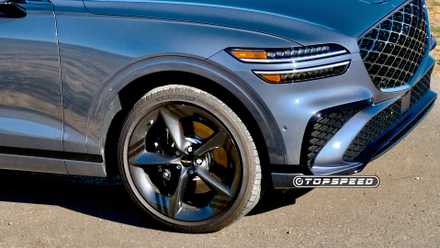 2026 Genesis GV70 3.5T Sport Prestige AWD Exterior dianteiro direito pneu e detalhe da roda