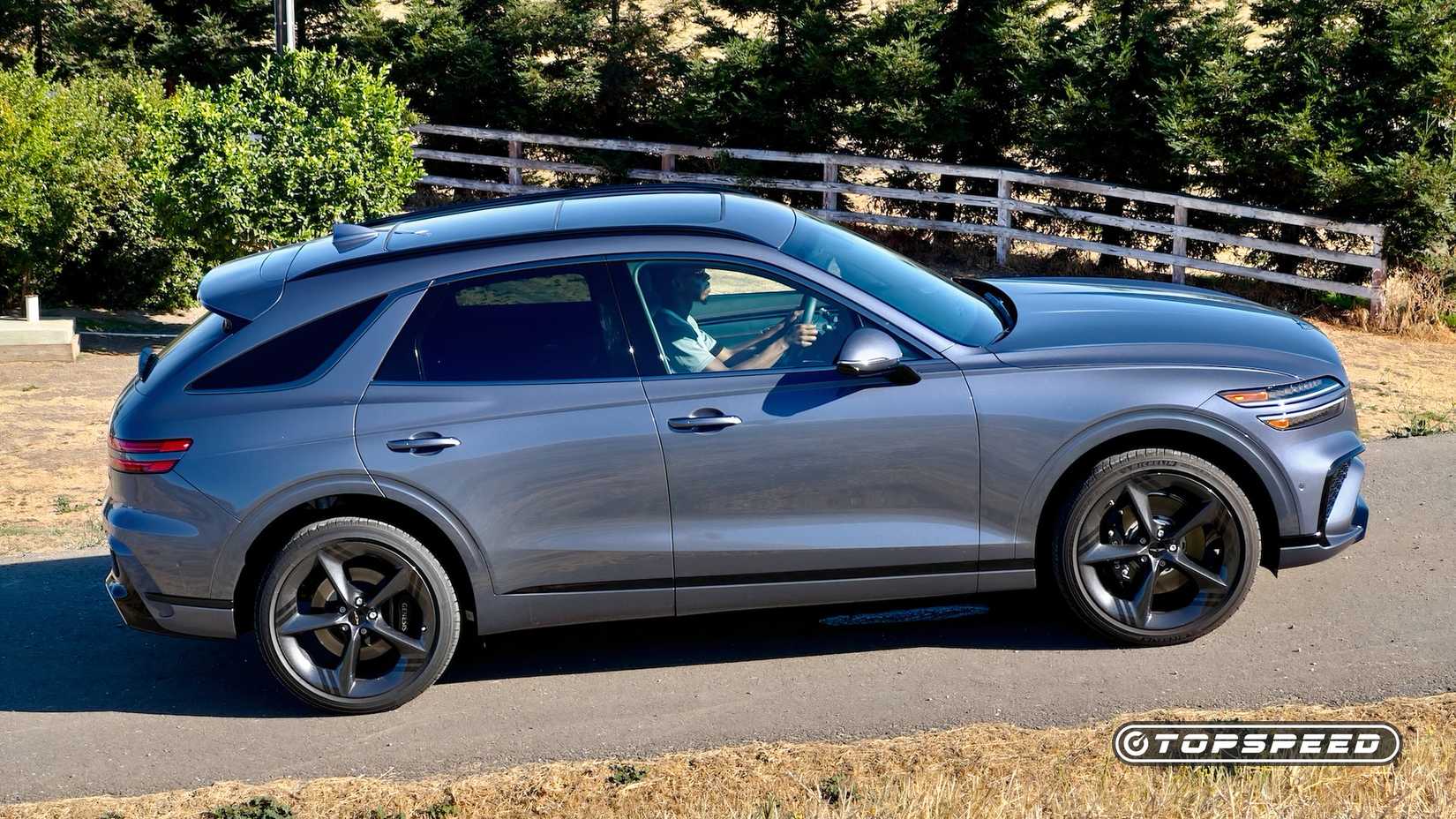 2026 Genesis GV70 3.5T Sport Prestige AWD Exterior Right Profile on road