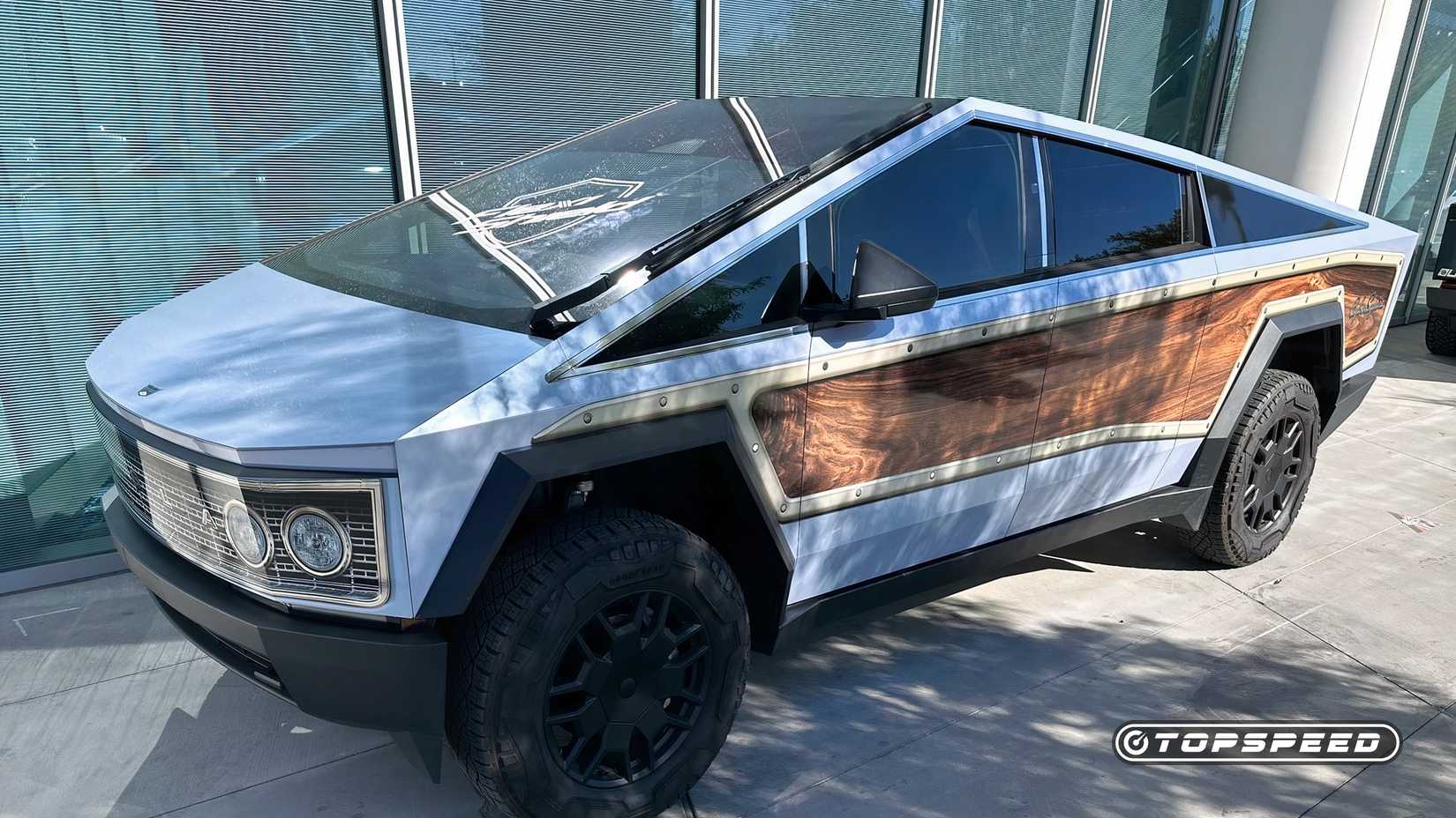 A Driver's Side View Of A Tesla Cybertruck With Custom Panel Wrap