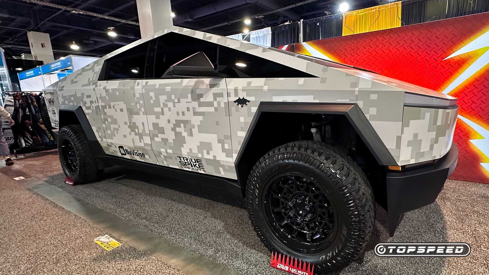 A Passenger's Side View Of A Tesla Cybertruck With Custom Mods