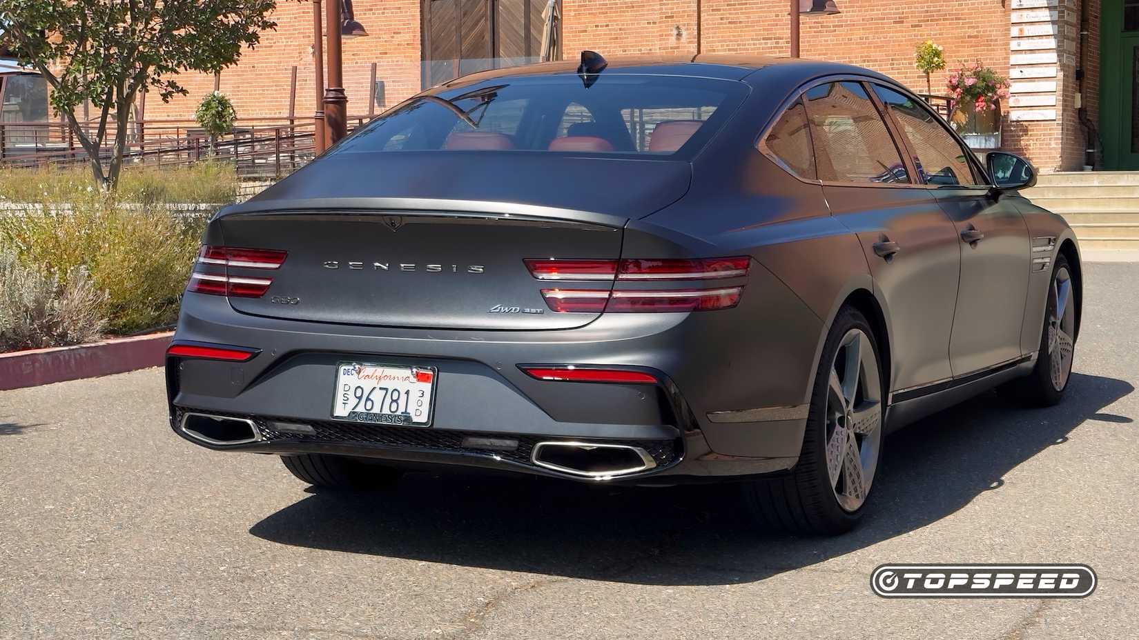 Genesis G80 3.5T AWD Exterior Rear 3.25 View parked on the road