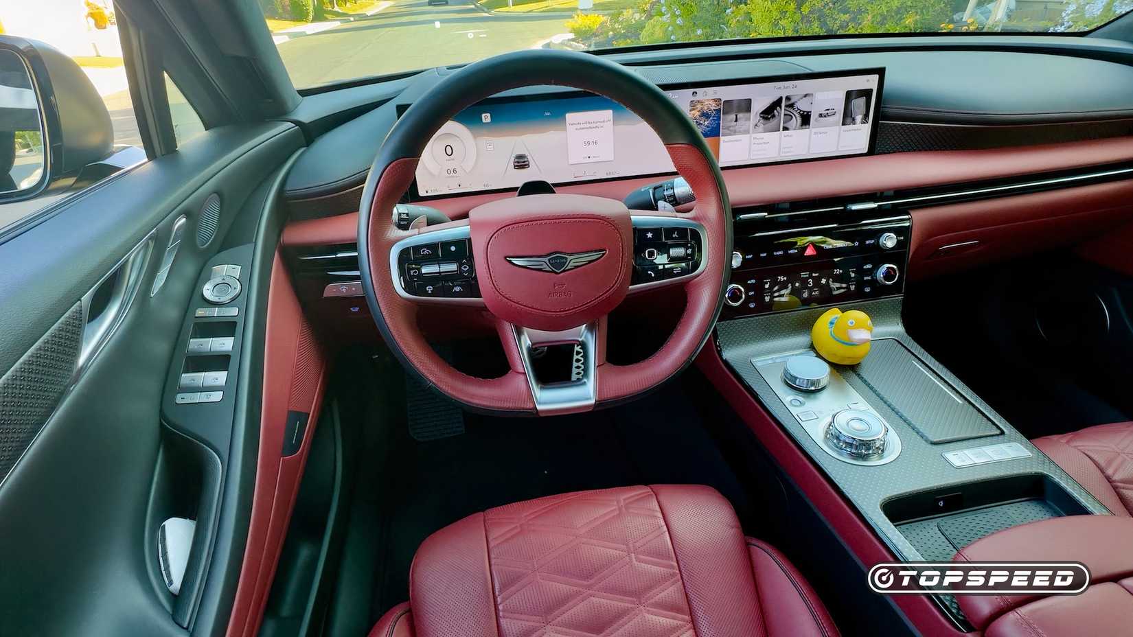 Foto do interior do Genesis G80 3.5T AWD mostrando a cabine frontal