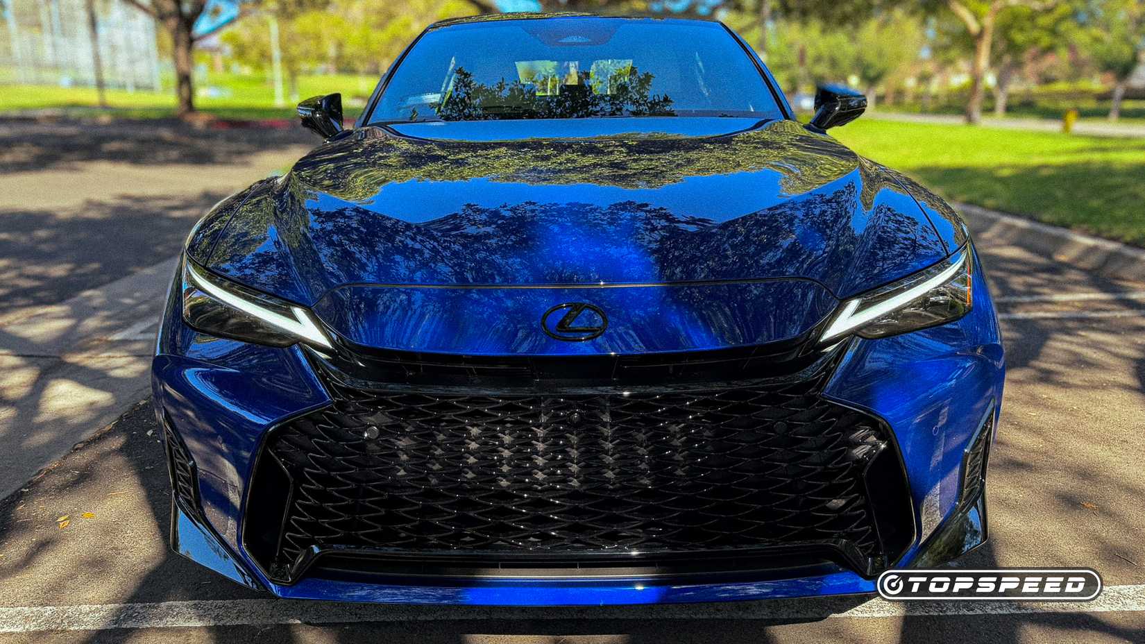 Blue parked 2026 Lexus IS 350 F Sport front shot