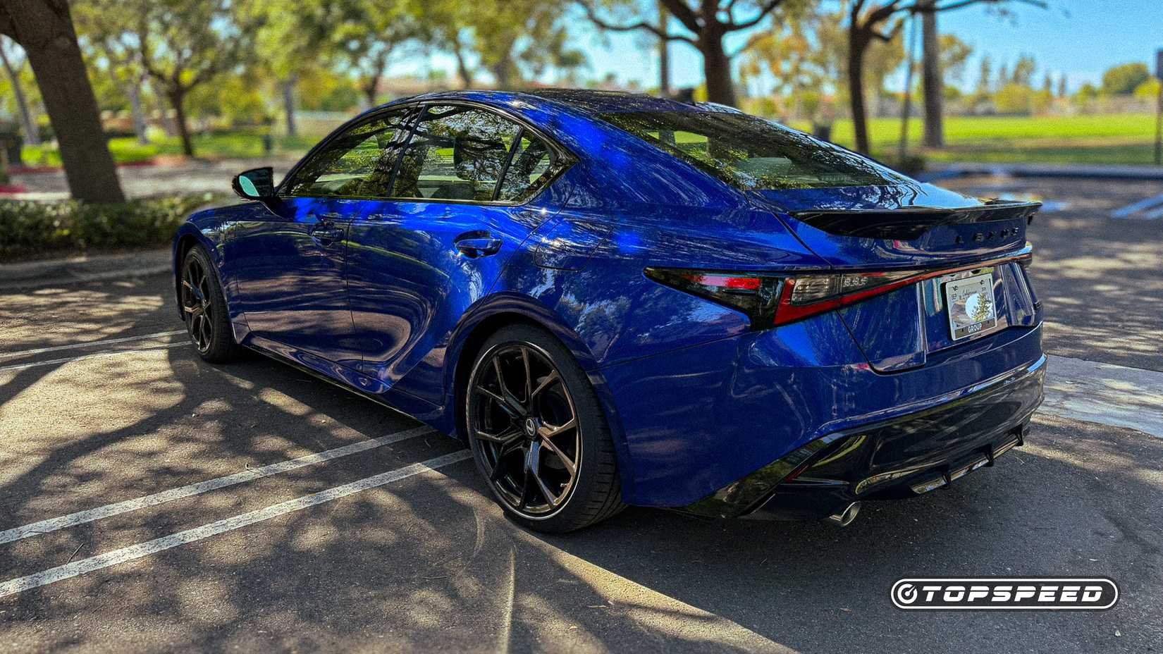 Blue 2026 Lexus IS 350 F Sport parked rear 3/4 shot